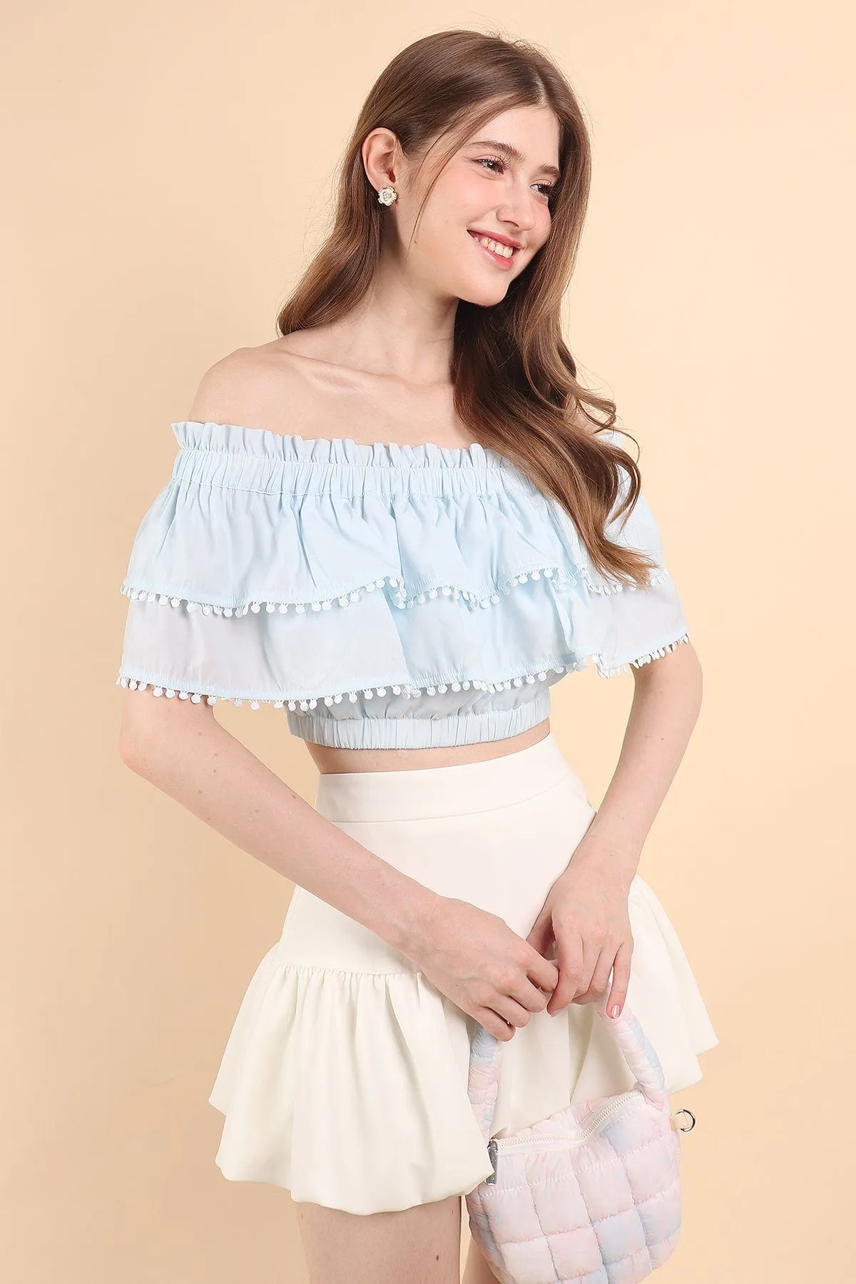 LINDSAY POM POM OFFSIE TOP IN BLUE