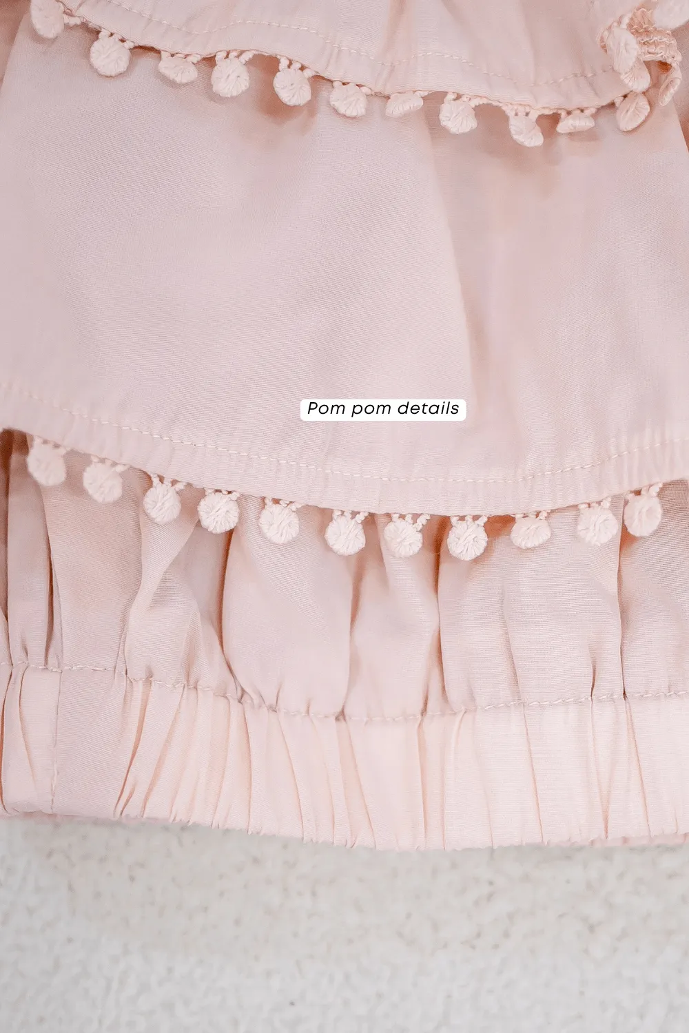 LINDSAY POM POM OFFSIE TOP IN BLUE
