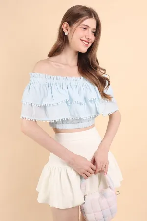 LINDSAY POM POM OFFSIE TOP IN BLUE