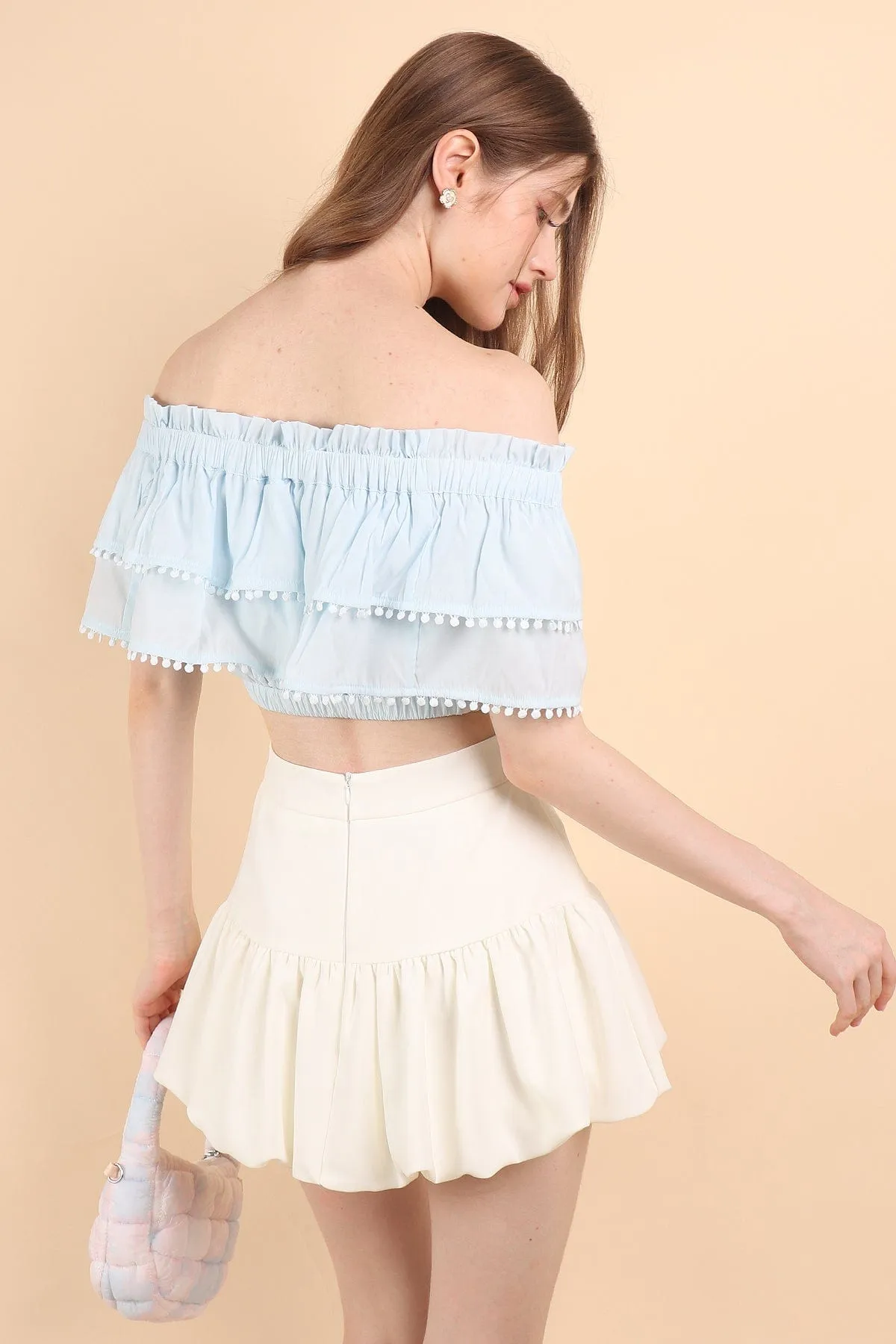 LINDSAY POM POM OFFSIE TOP IN BLUE