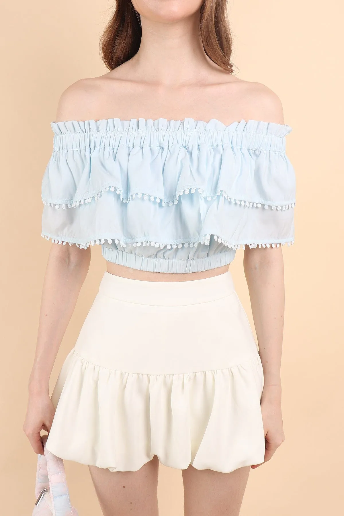 LINDSAY POM POM OFFSIE TOP IN BLUE