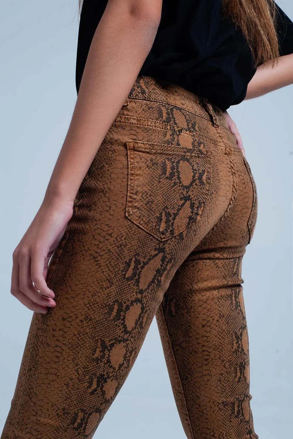 Orange Reversible Snake Print Skinny Jeans