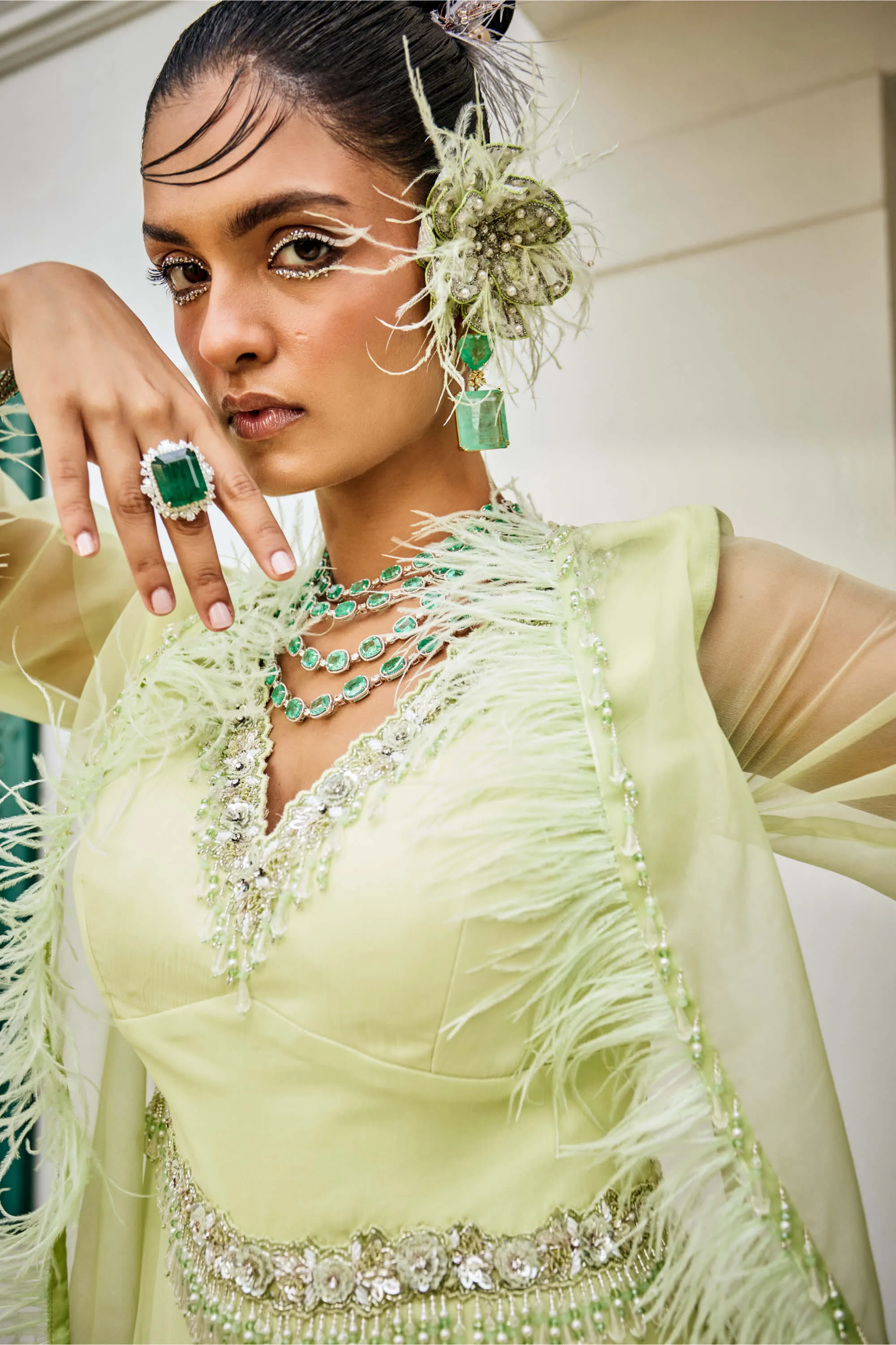 Sylvie butterfly green feather jacket and jumpsuit